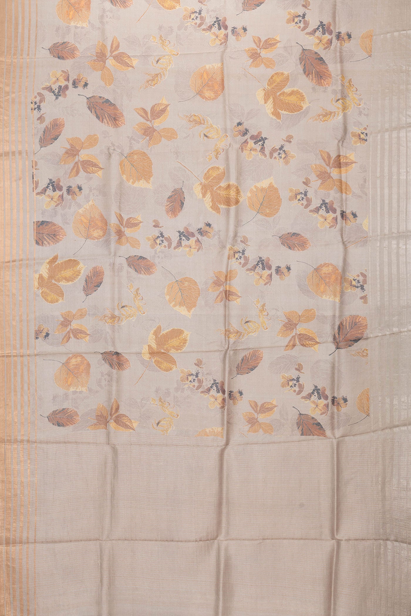 Flat view of Beige Dual Tone Tussar Silk Saree with Printed design on the body and Zari Border. 