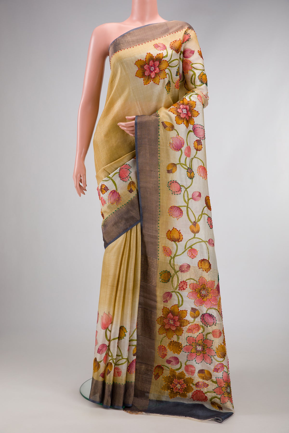 Sandal Tussar Silk Saree with Plain Body and Fancy Border.  displayed on a mannequin