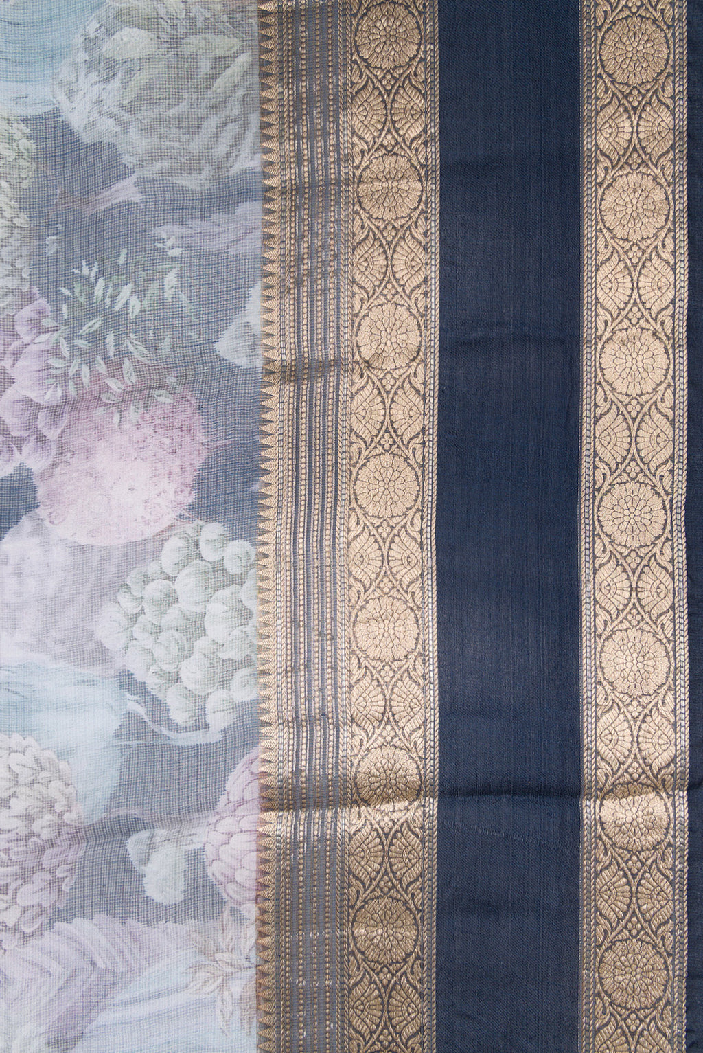 Border image of Navy Blue Dual Tone Tussar Silk Saree with Printed design on the body and Zari Border. 