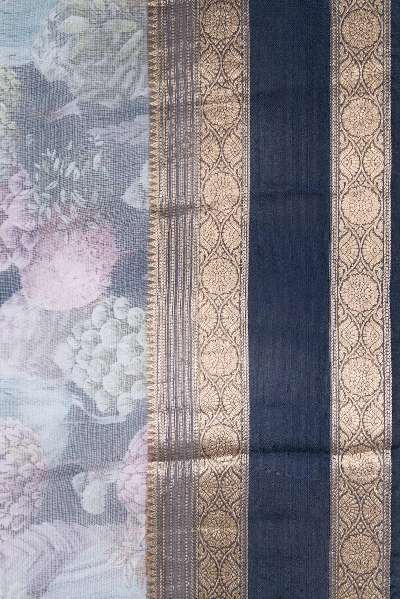 Border image of Navy Blue Dual Tone Tussar Silk Saree with Printed design on the body and Zari Border. 