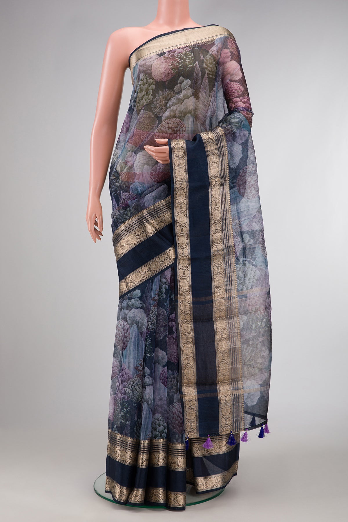 Navy Blue Dual Tone Tussar Silk Saree with Printed design on the body and Zari Border.  displayed on a mannequin