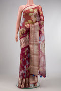 Maroon Dual Tone Tussar Silk Saree with Printed design on the body and Zari Border.  displayed on a mannequin