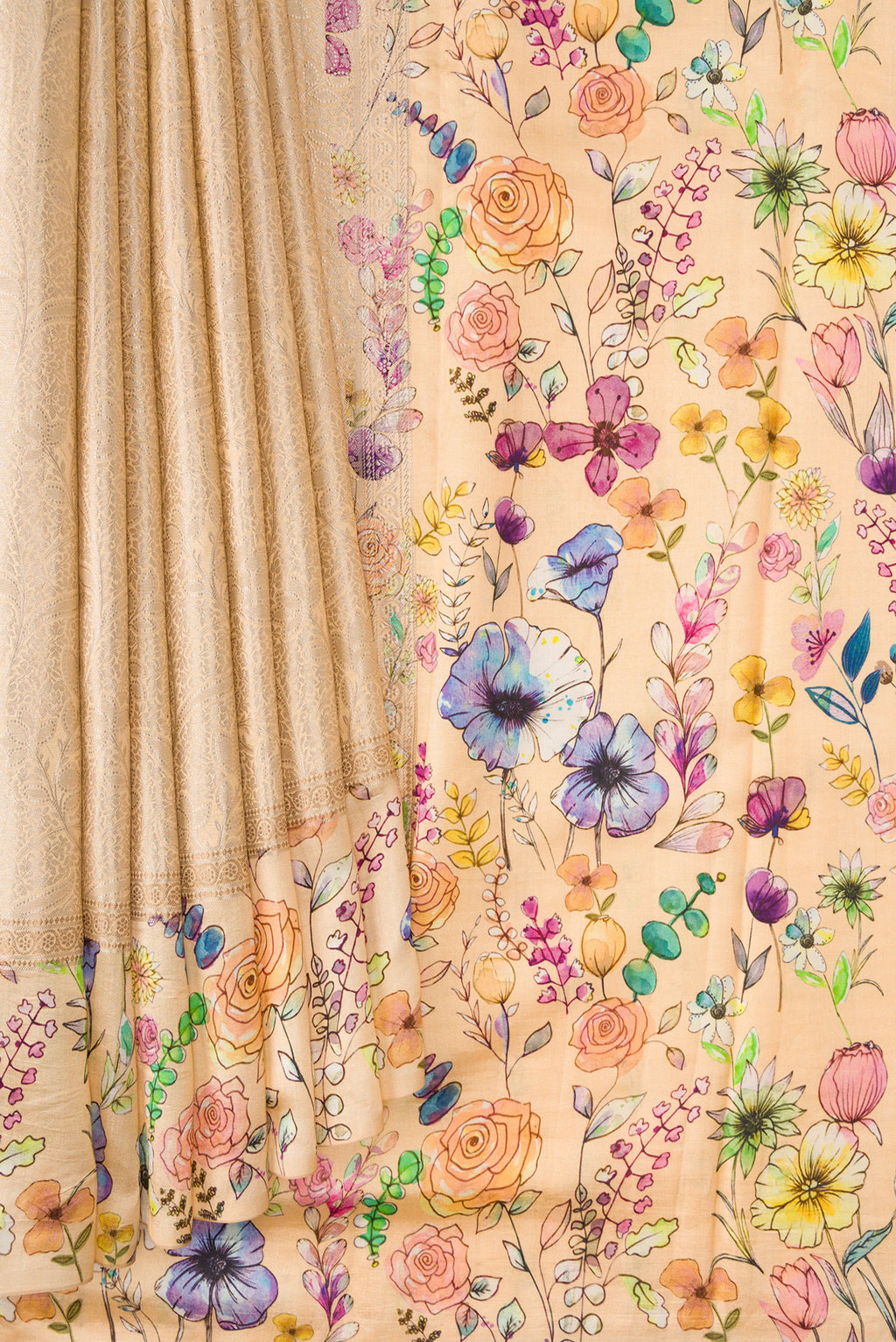 Pleats and pallu of Beige Dual Tone Tussar Silk Saree with Printed design on the body and Printed Border. 