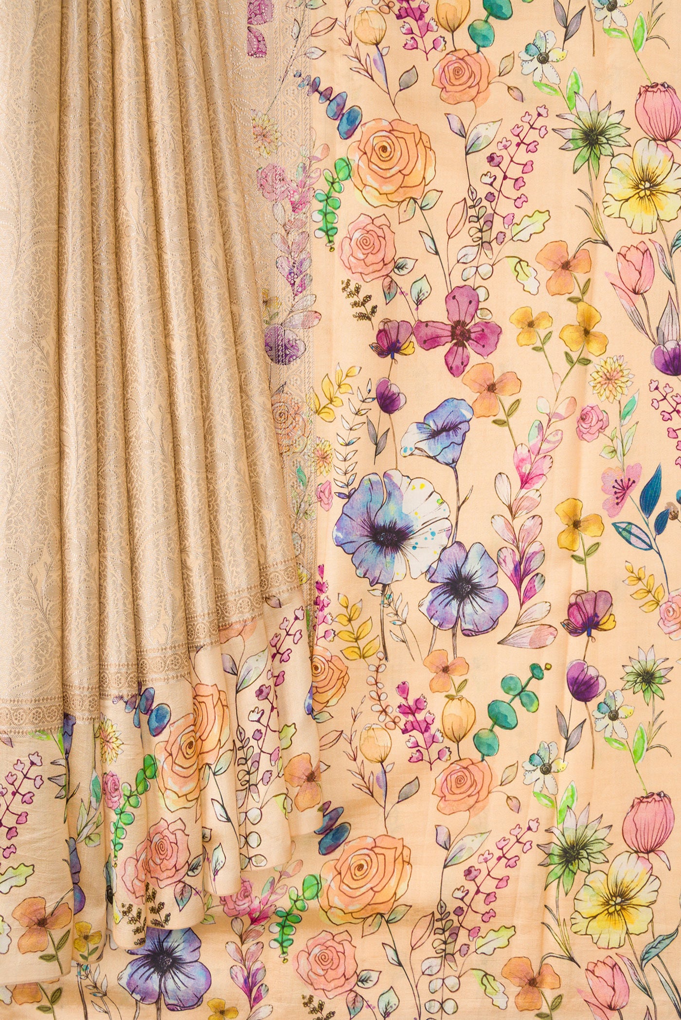 Pleats and pallu of Beige Dual Tone Tussar Silk Saree with Printed design on the body and Printed Border. 