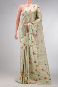 Light Green Dual Tone Tussar Silk Saree with Printed design on the body and Printed Border.  displayed on a mannequin