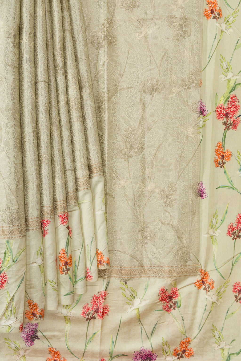 Pleats and pallu of Light Green Dual Tone Tussar Silk Saree with Printed design on the body and Printed Border. 