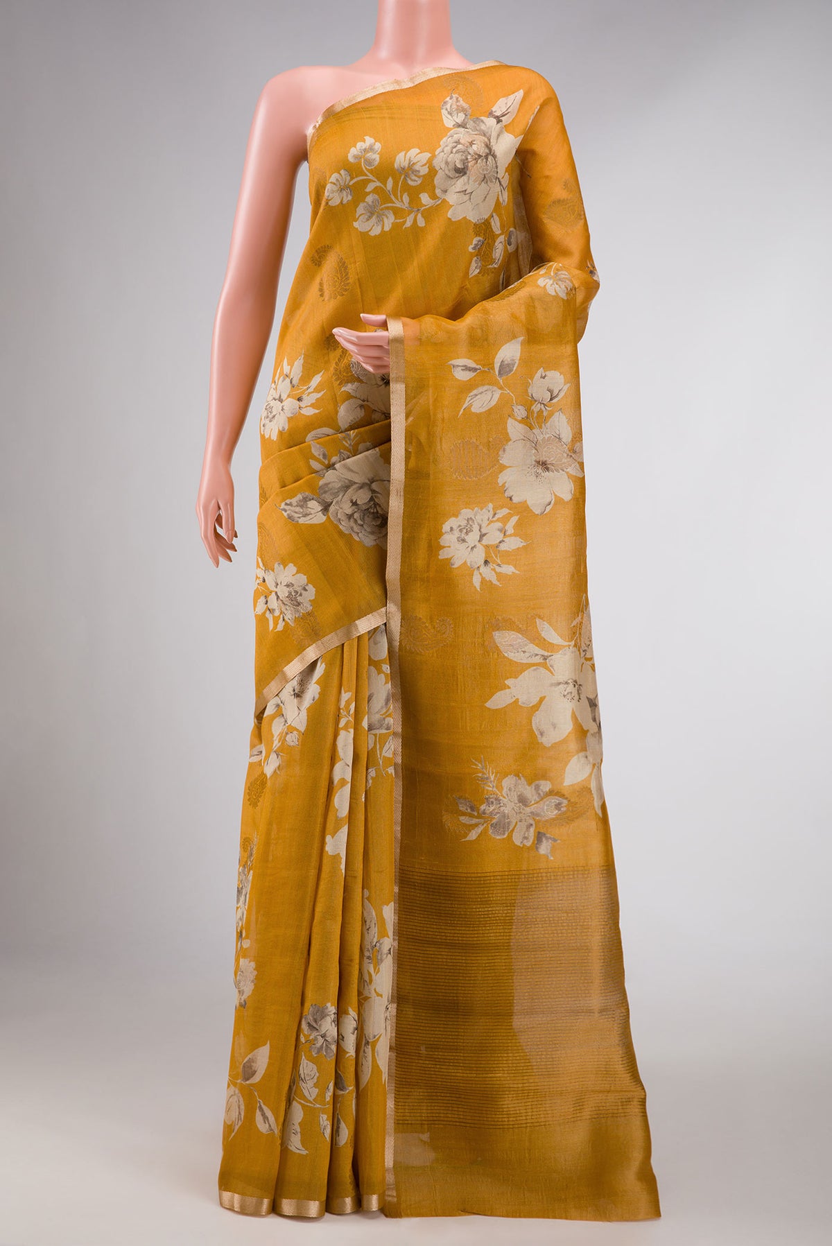 Yellow Dual Tone Tussar Silk Saree with Printed design on the body and Zari Border displayed on a mannequin