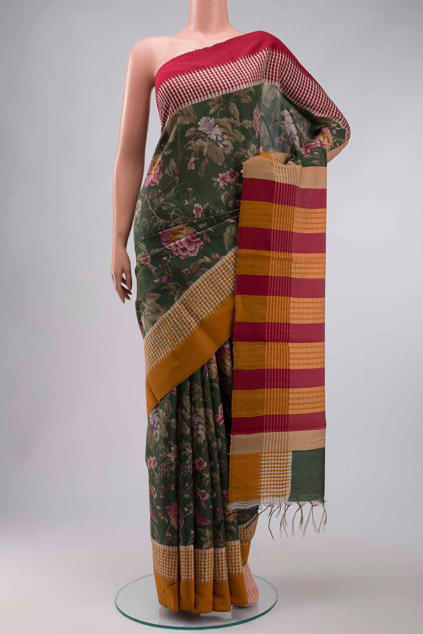 Green Bhagalpuri Tussar Silk Saree with Printed design on the body and Checks Border displayed on a mannequin
