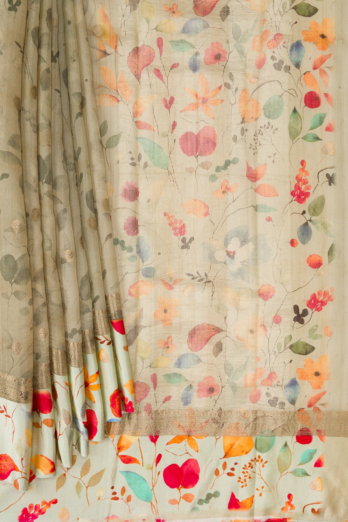 Pleats and pallu of Grey Dual Tone Tussar Silk Saree with Printed design on the body and Printed Border. 