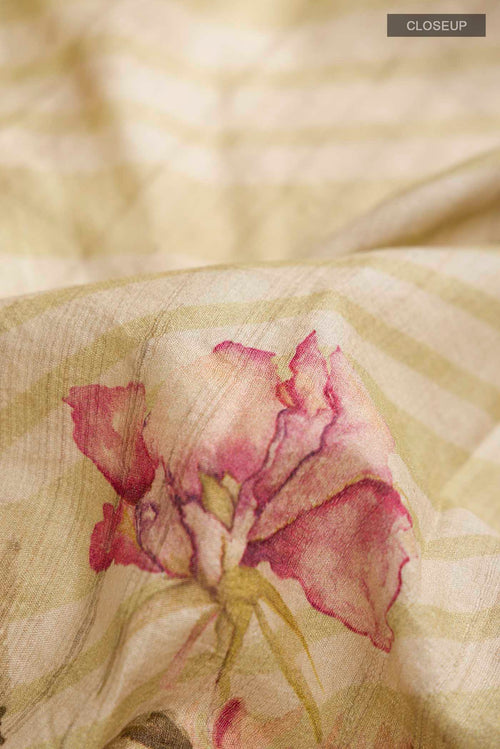 Close up of Beige Bhagalpuri Tussar Silk Saree with Printed design on the body and Zari Border displaying folds