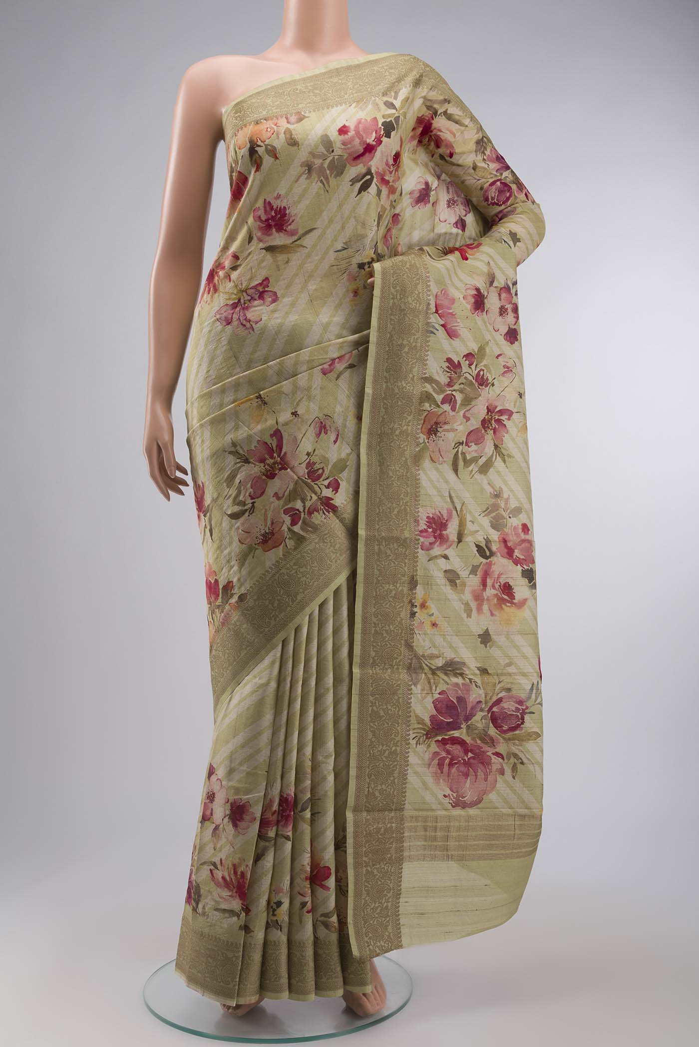 Beige Bhagalpuri Tussar Silk Saree with Printed design on the body and Zari Border displayed on a mannequin