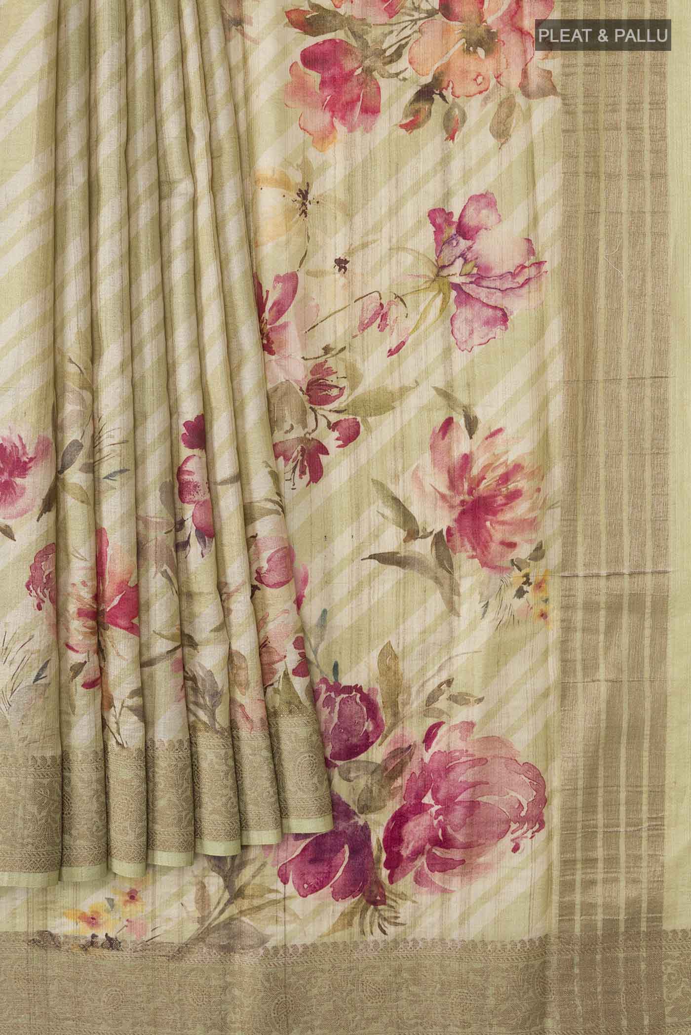 Pleats and pallu of Beige Bhagalpuri Tussar Silk Saree with Printed design on the body and Zari Border