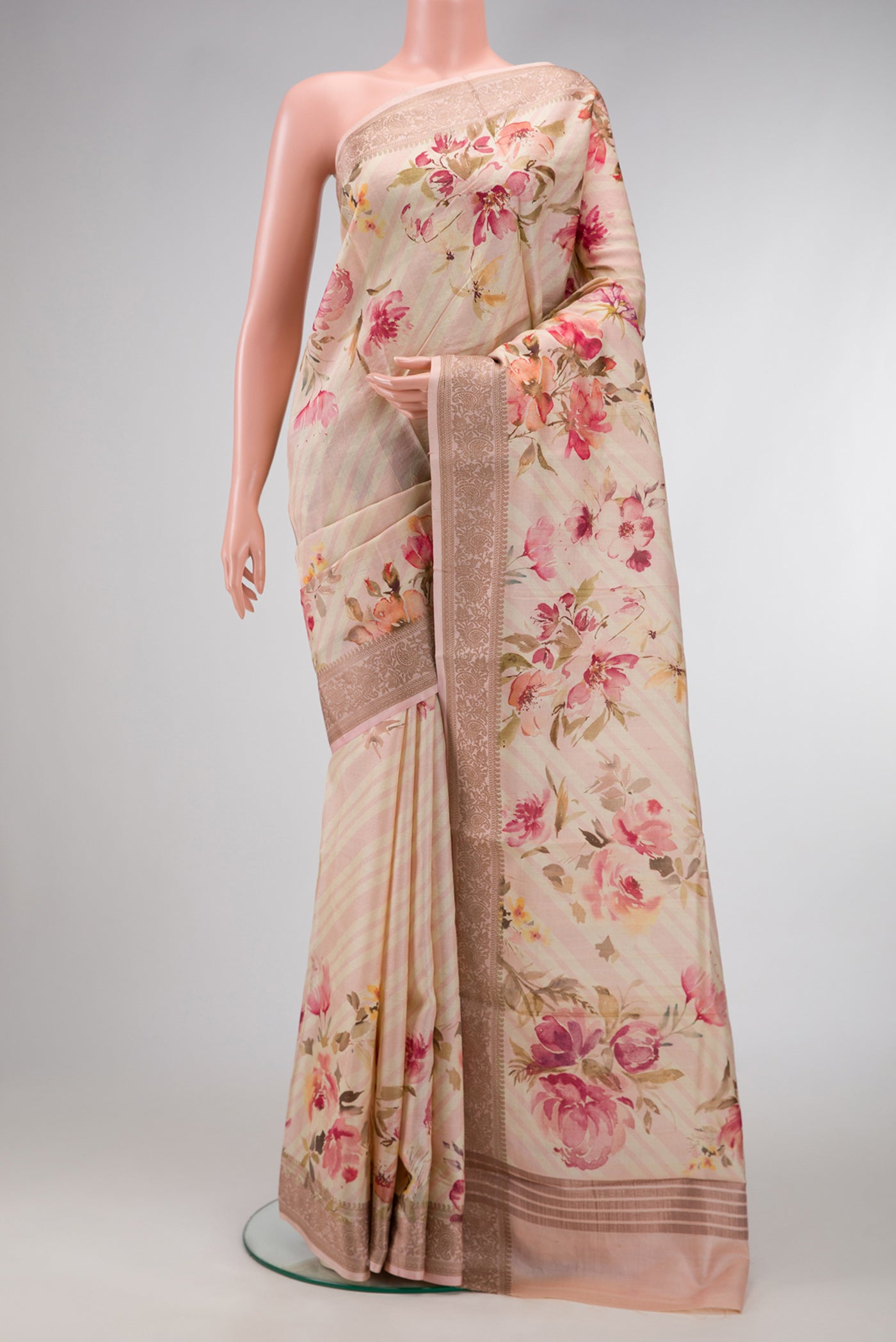 Beige Dual Tone Tussar Silk Saree with Printed design on the body and Thread Border.  displayed on a mannequin