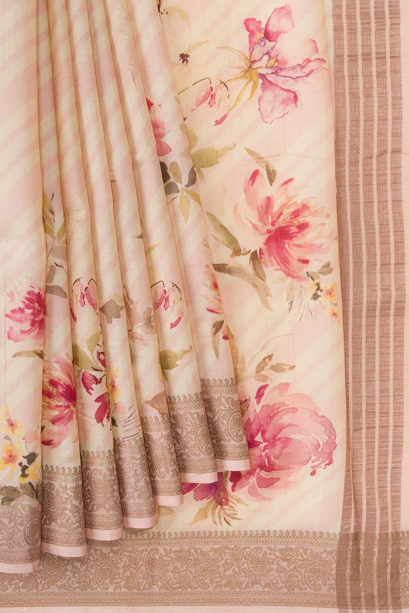 Pleats and pallu of Beige Dual Tone Tussar Silk Saree with Printed design on the body and Thread Border. 