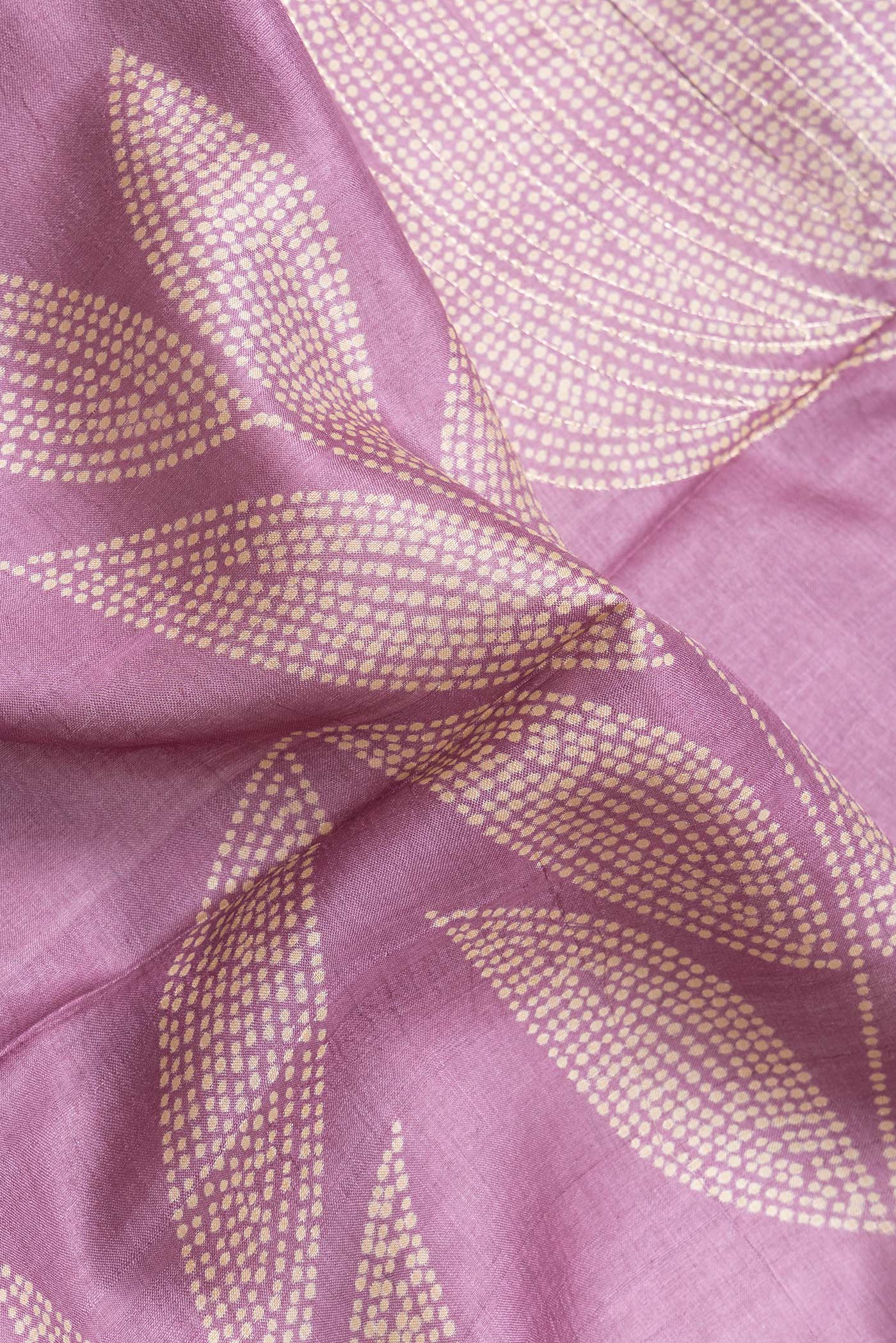 Close up of Pink Dual Tone Tussar Silk Saree with Embroidery on the body and Zari Border.  displaying folds