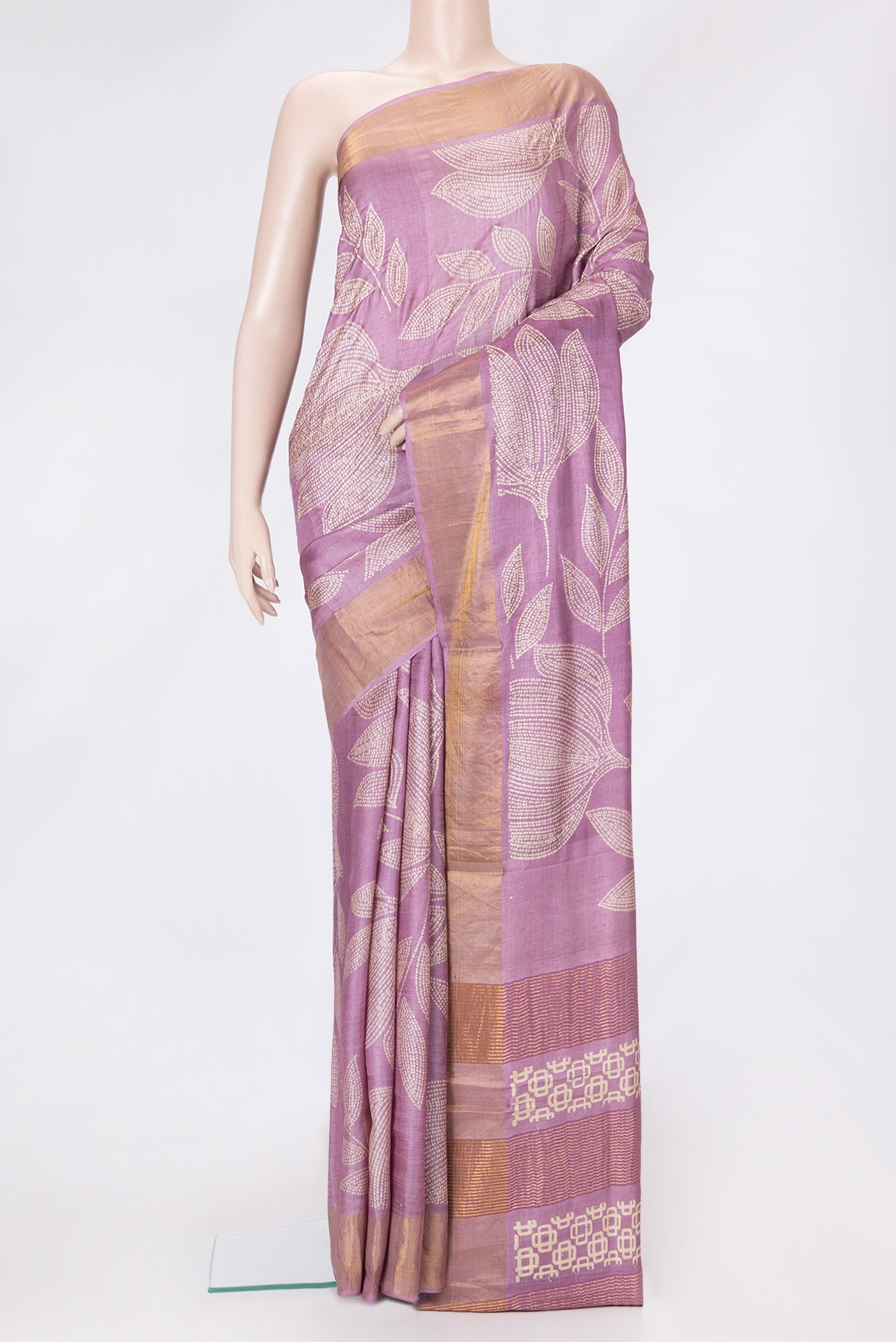 Pink Dual Tone Tussar Silk Saree with Embroidery on the body and Zari Border.  displayed on a mannequin