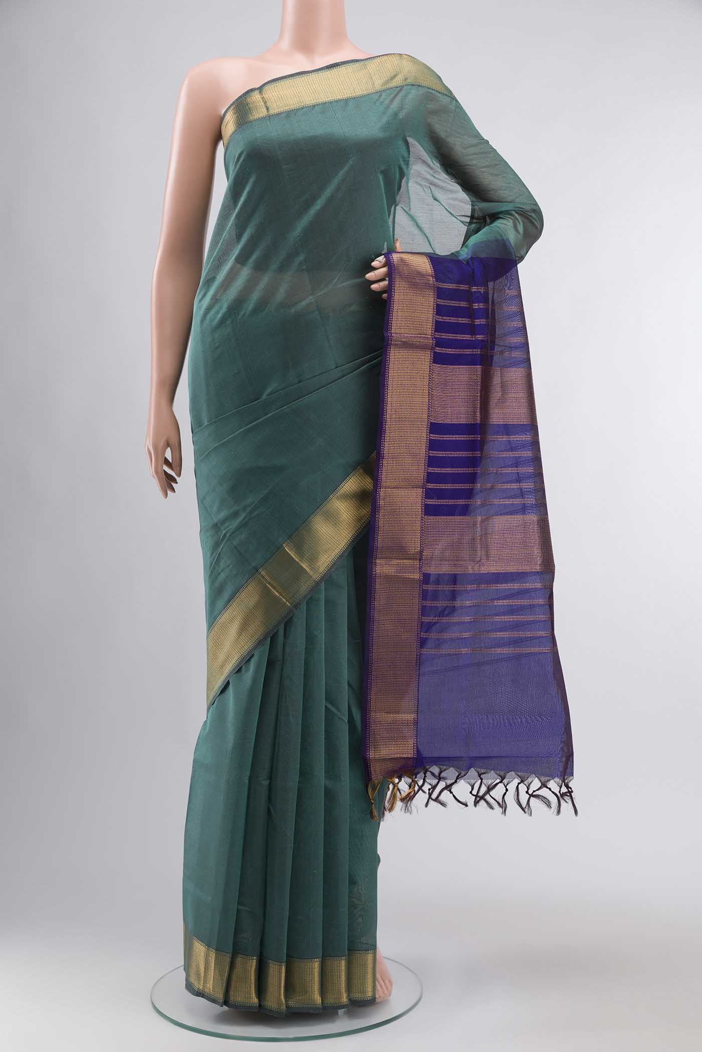 Blue Silk Cotton Saree with Plain Body and Zari Border displayed on a mannequin