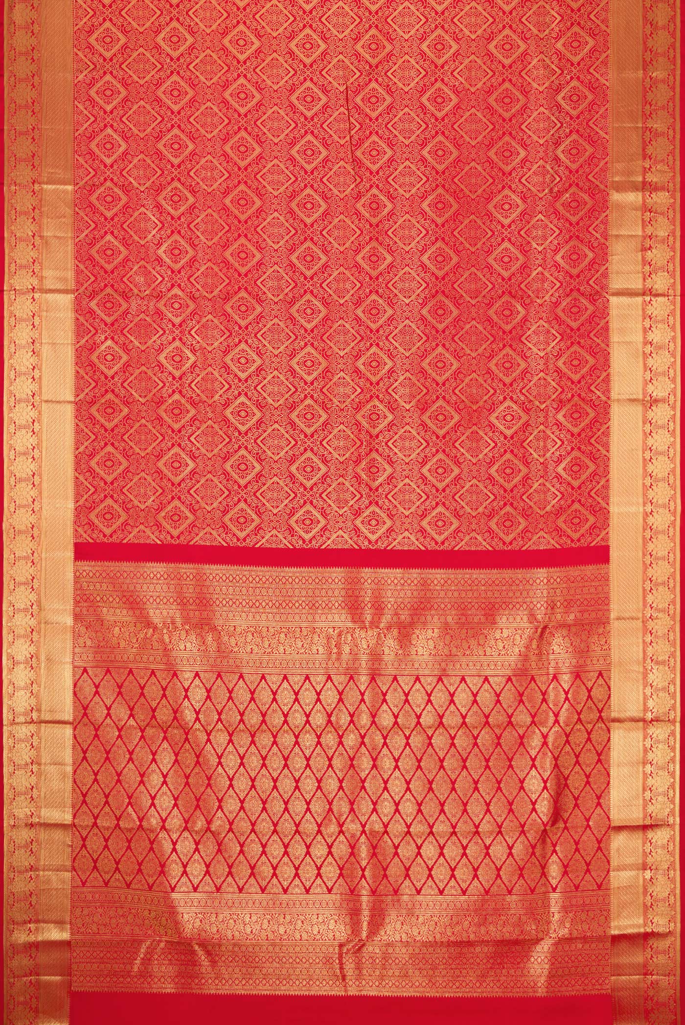Flat view of Red Dual Tone Kanchipuram Silk Saree with Zari Brocade on the body and Zari Border. 