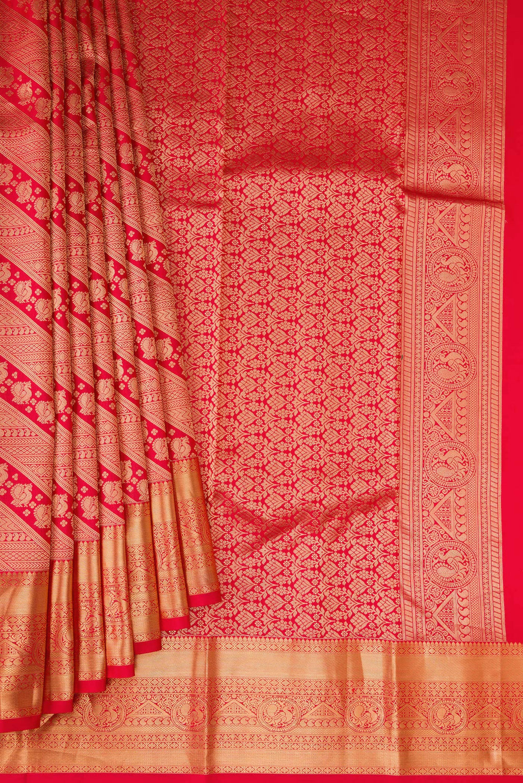 Pleats and pallu of Red Kanchipuram Silk Saree with Zari Brocade on the body and Zari Border. 