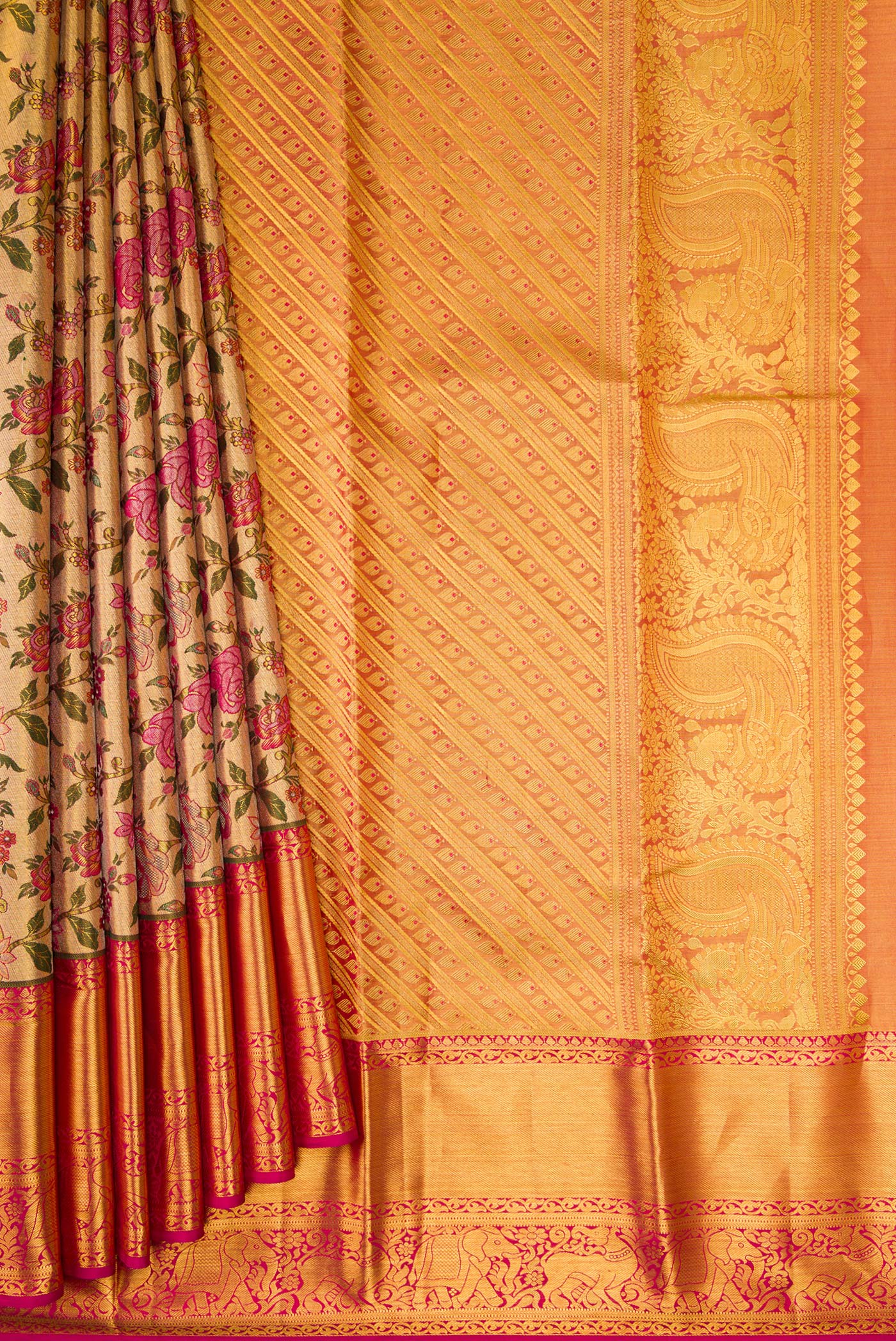 Pleats and pallu of Gold Dual Tone Kanjivaram Tissue Silk Saree with Zari Brocade on the body and Zari Border. 