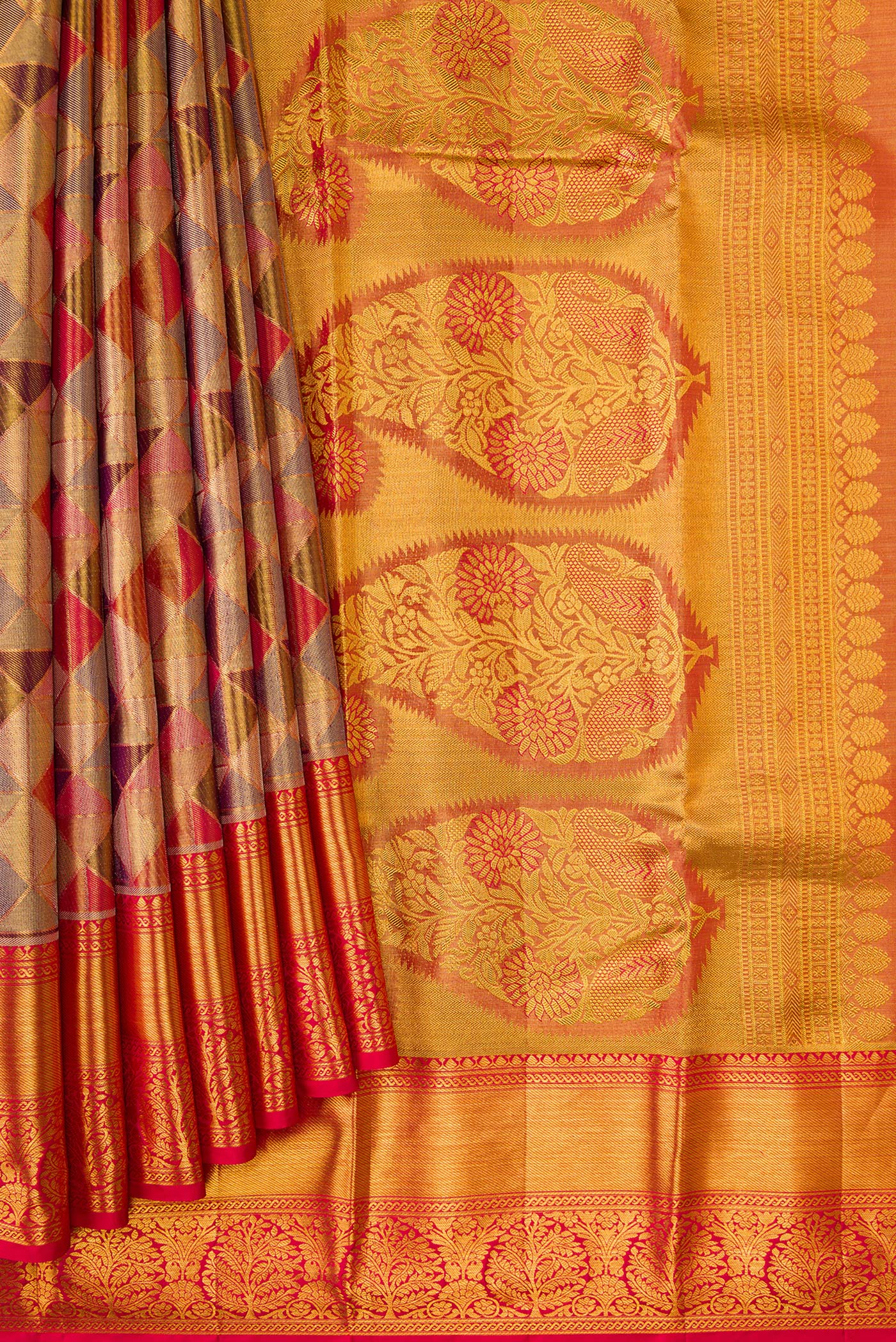 Pleats and pallu of Gold Dual Tone Kanjivaram Tissue Silk Saree with Zari Brocade on the body and Zari Border. 