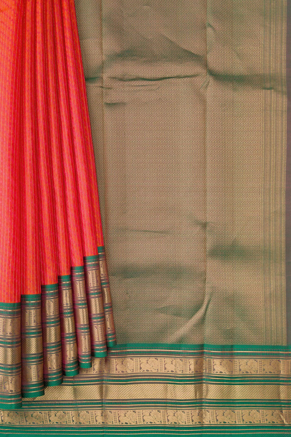 Pleats and pallu of Orange Dual Tone Kanchipuram Silk Saree with Jacquard design on the body and Zari Border. 