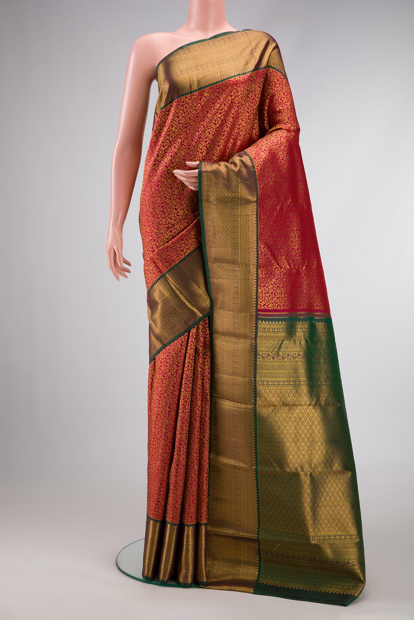 Maroon Dual Tone Kanchipuram Silk Saree with Zari Brocade on the body and Zari Border.  displayed on a mannequin