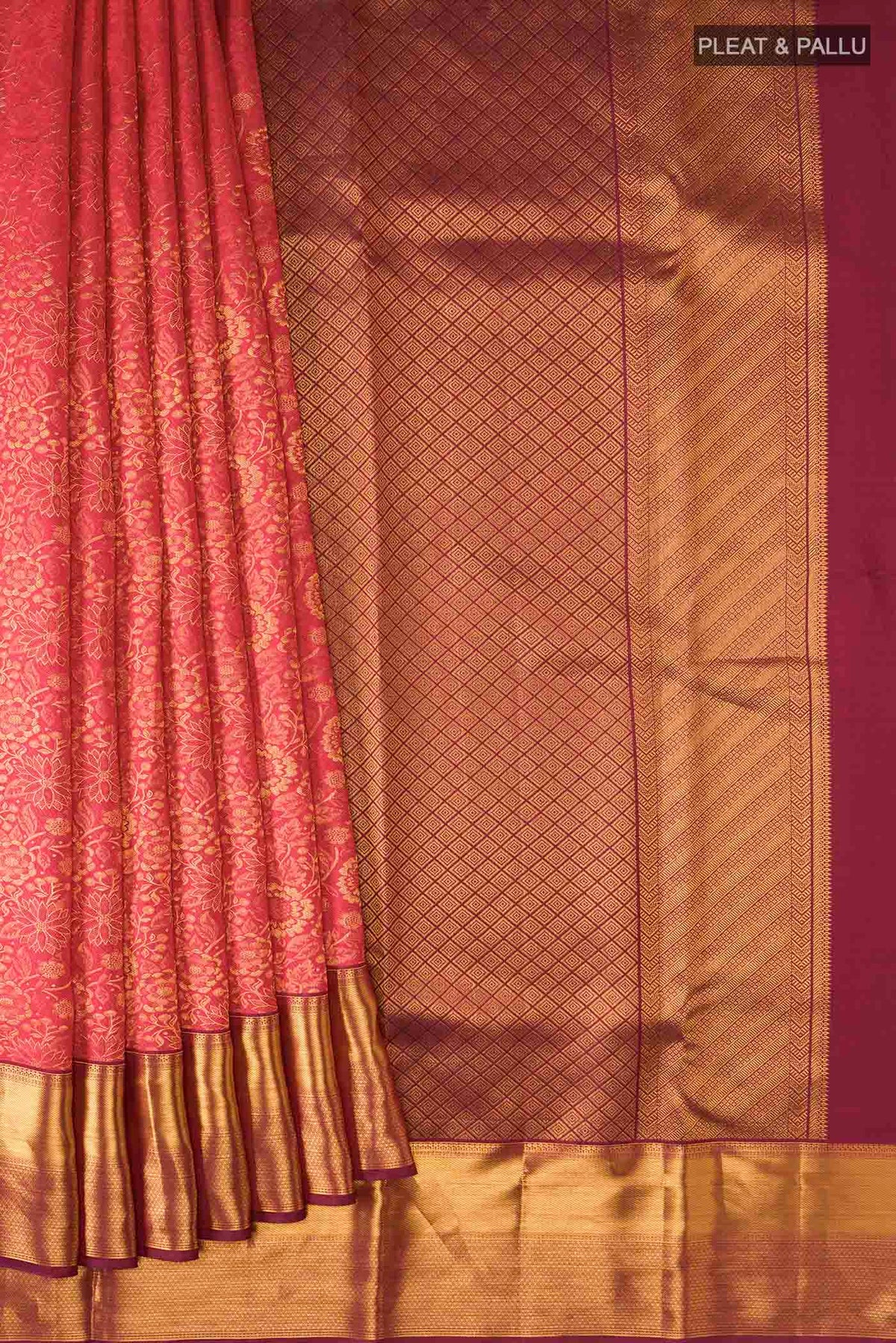 Pleats and pallu of Red Kanchipuram Silk Saree with Zari Brocade on the body and Zari Border