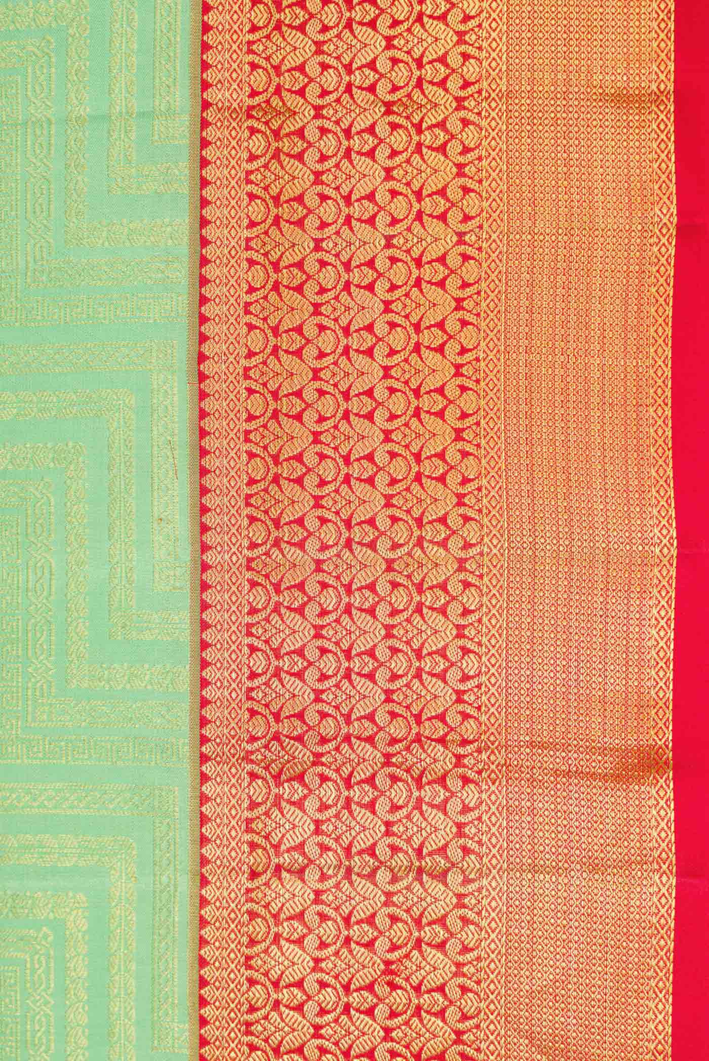 Border image of Pista Green Dual Tone Kanchipuram Silk Saree with Zari Brocade on the body and Zari Border. 