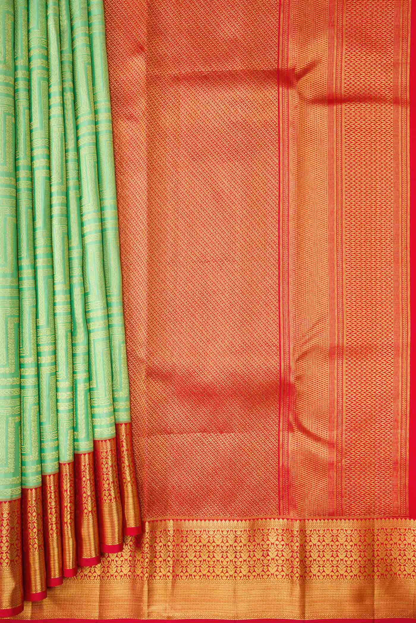 Pleats and pallu of Pista Green Dual Tone Kanchipuram Silk Saree with Zari Brocade on the body and Zari Border. 