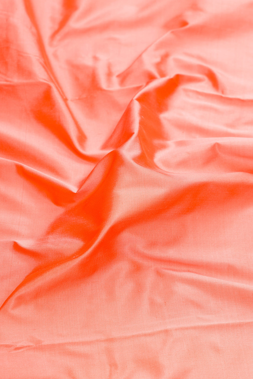 Close up of Peach Dual Tone Kanchipuram Silk Nine Yards Saree with Stripes on the body and Zari Border.  displaying folds