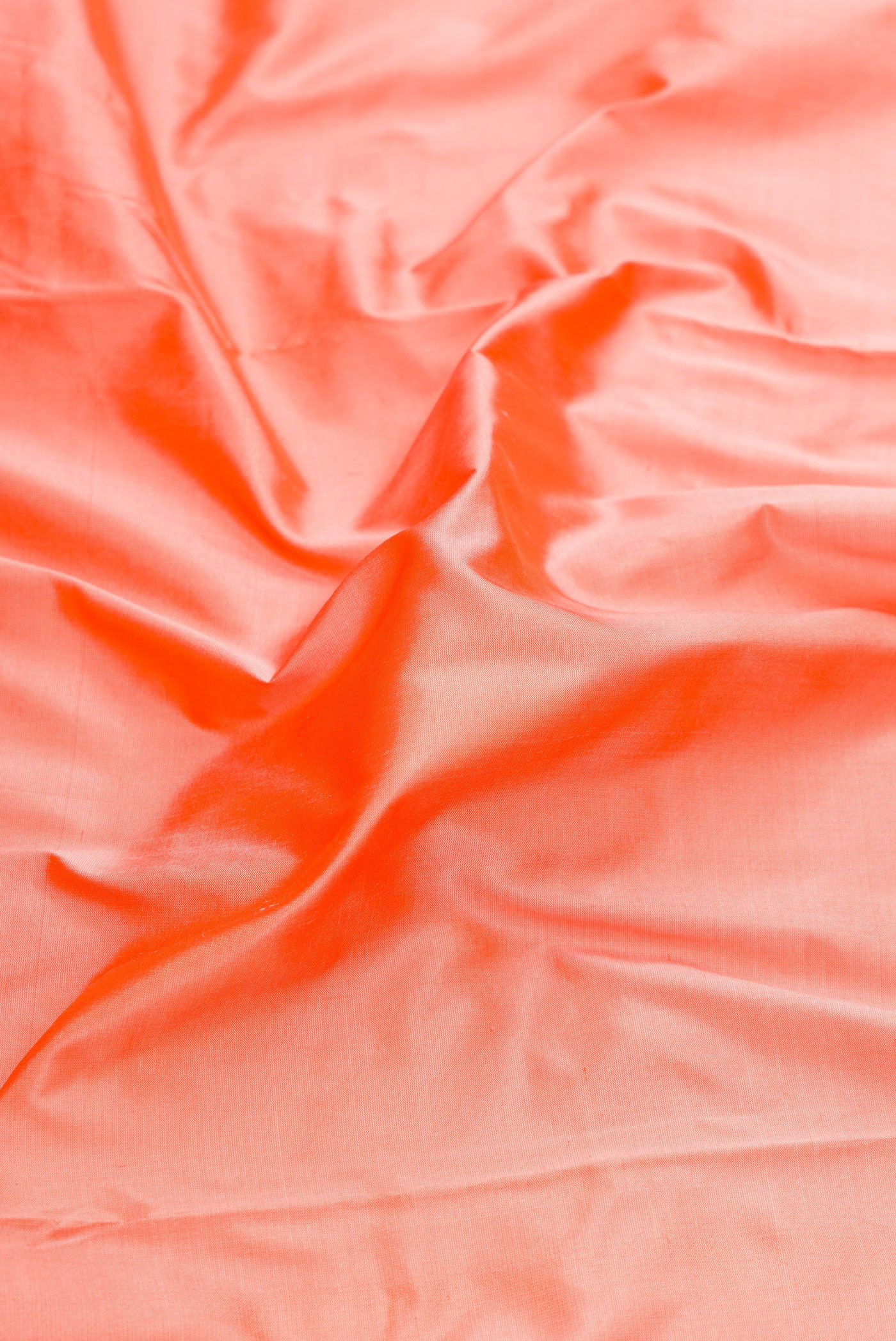Close up of Peach Dual Tone Kanchipuram Silk Nine Yards Saree with Stripes on the body and Zari Border.  displaying folds