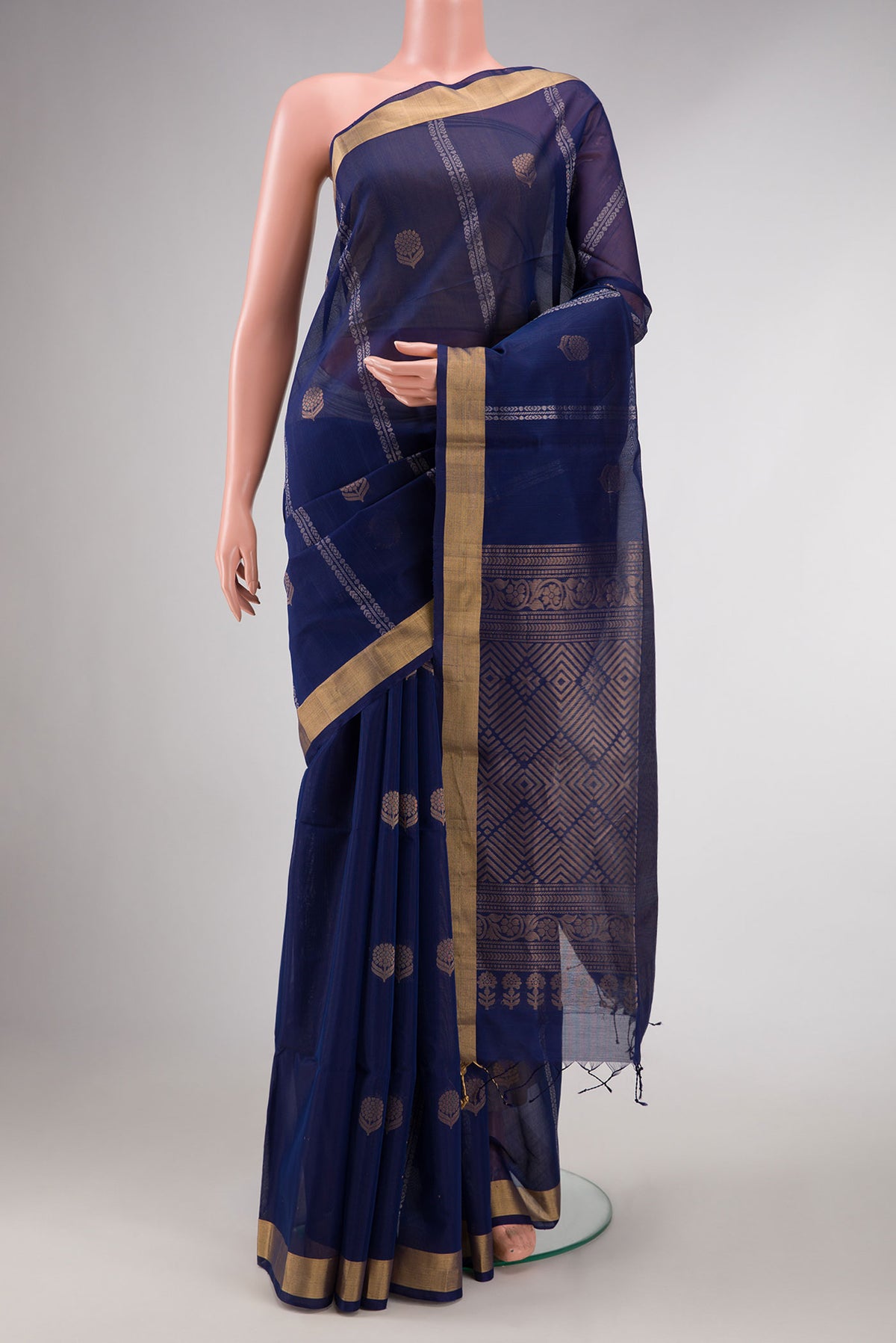 Navy Blue Dual Tone Silk Cotton Saree with Zari Butta on the body and Zari Border displayed on a mannequin