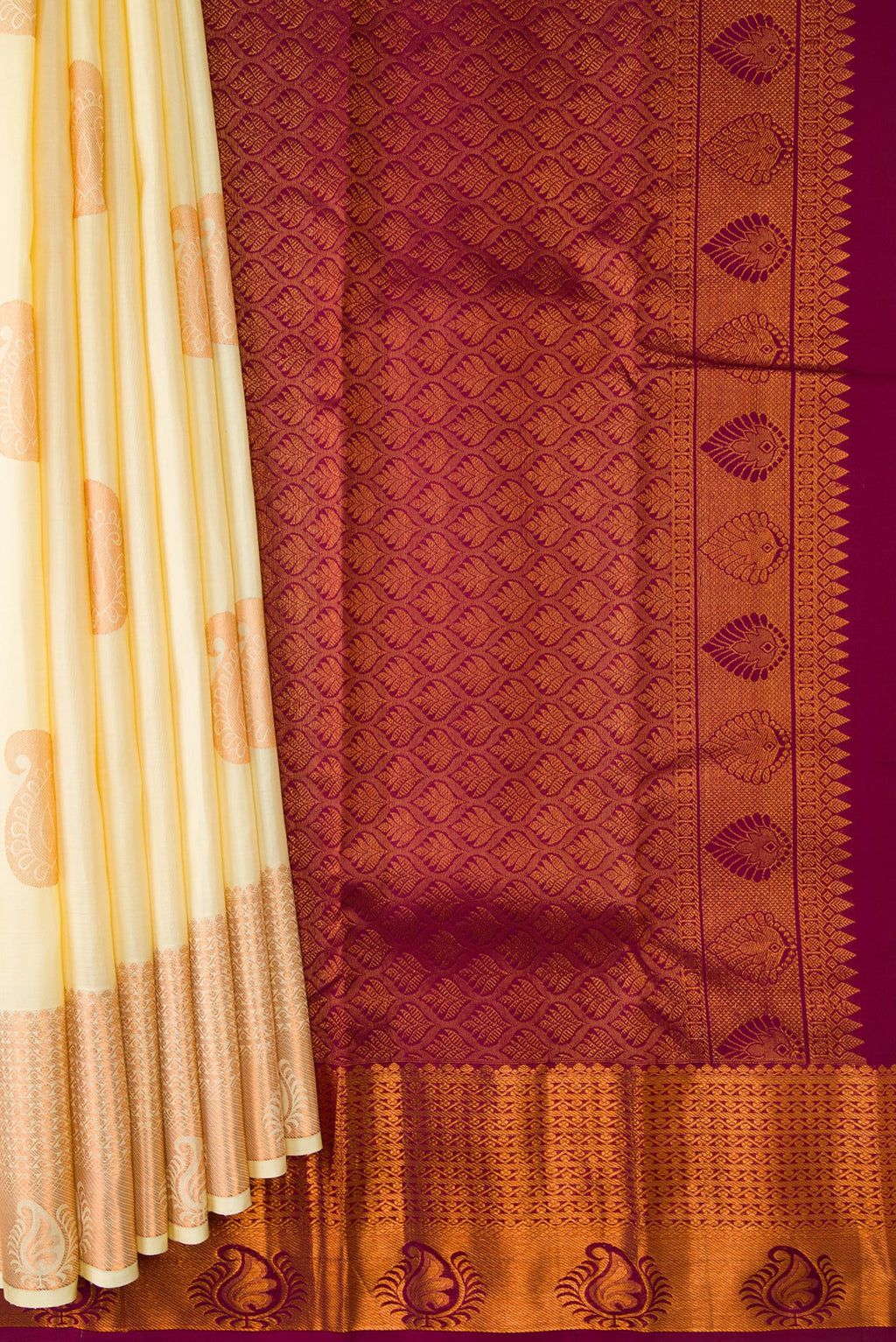 Pleats and pallu of Sandal Dual Tone Kanjivaram Silk Saree with Zari Butta on the body and Zari Border. 
