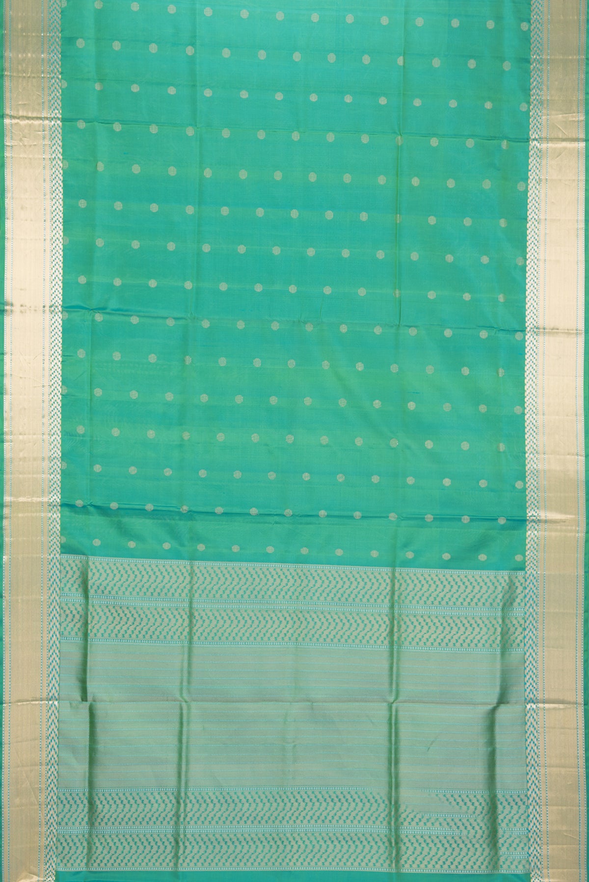 Flat view of Pure Silk Sea Green Dual Tone Soft Saree with Zari Butta on the body and Zari Border. 