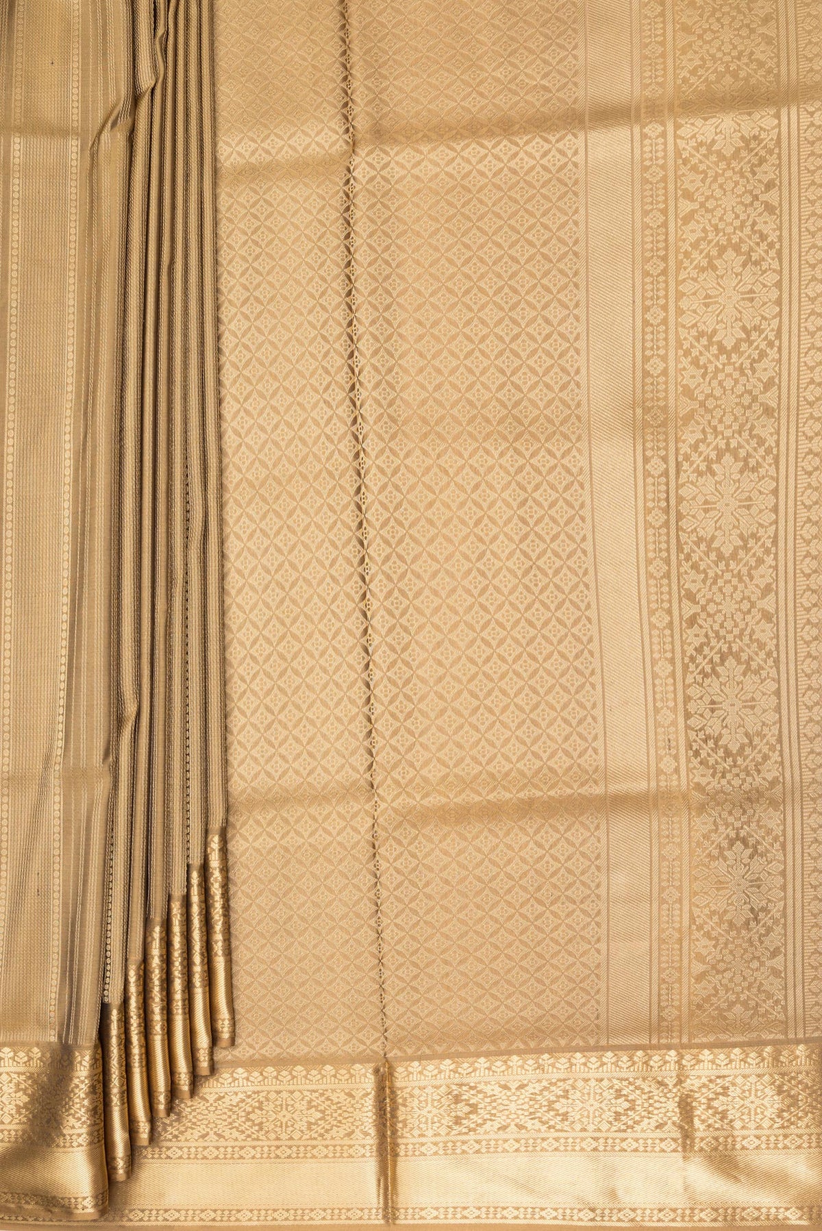 Pleats and pallu of Pure Silk Brown Soft Saree with Stripes on the body and Zari Border. 