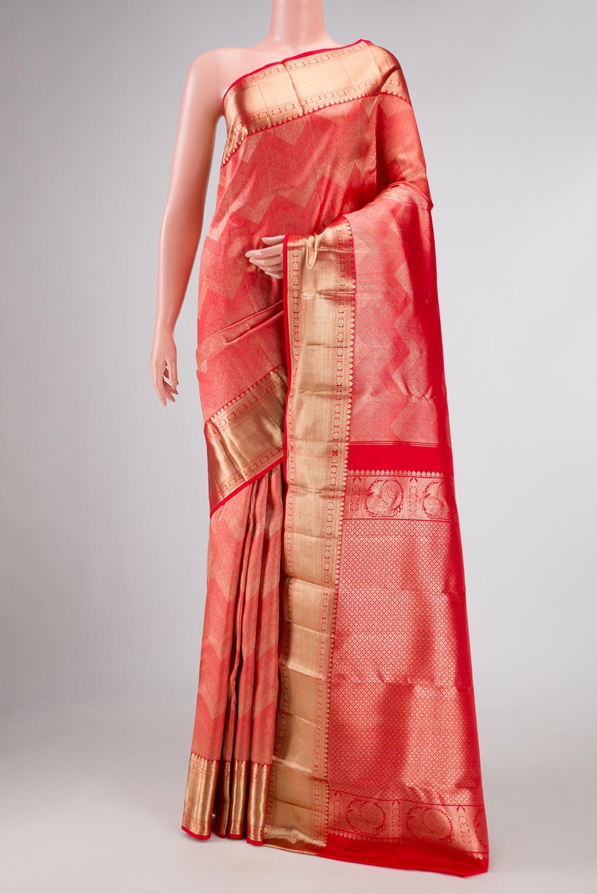 Dark Pink Dual Tone Kanchipuram Silk Saree with Zari Brocade on the body and Zari Border displayed on a mannequin