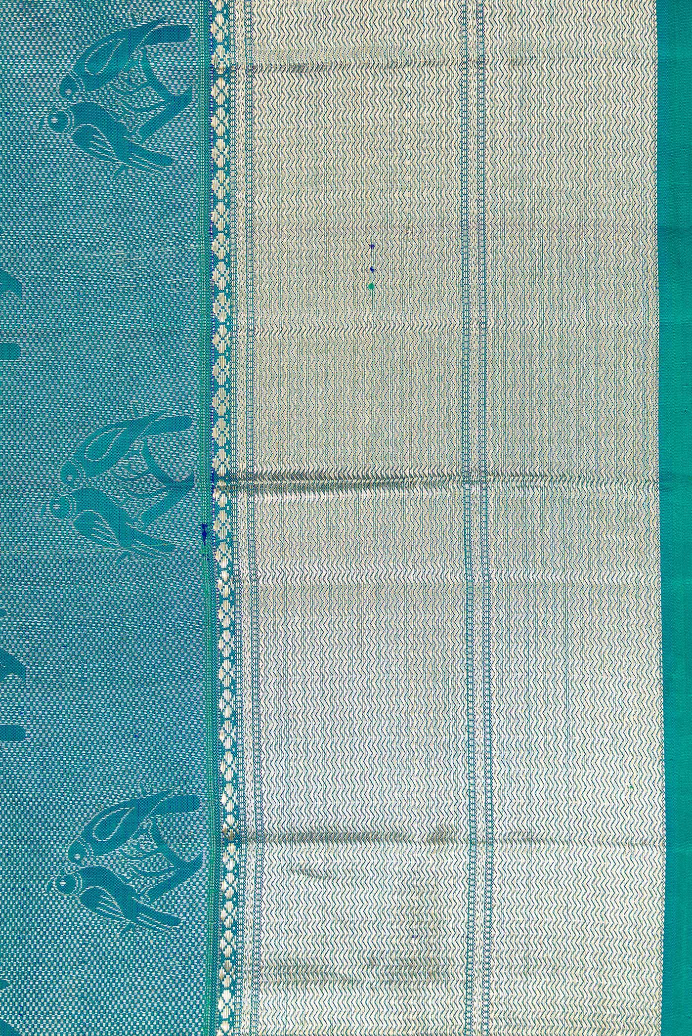Border image of Peacock Blue Dual Tone Kanchipuram Silk Saree with Zari Brocade on the body and Zari Border. 