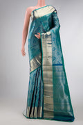 Peacock Blue Dual Tone Kanchipuram Silk Saree with Zari Brocade on the body and Zari Border.  displayed on a mannequin