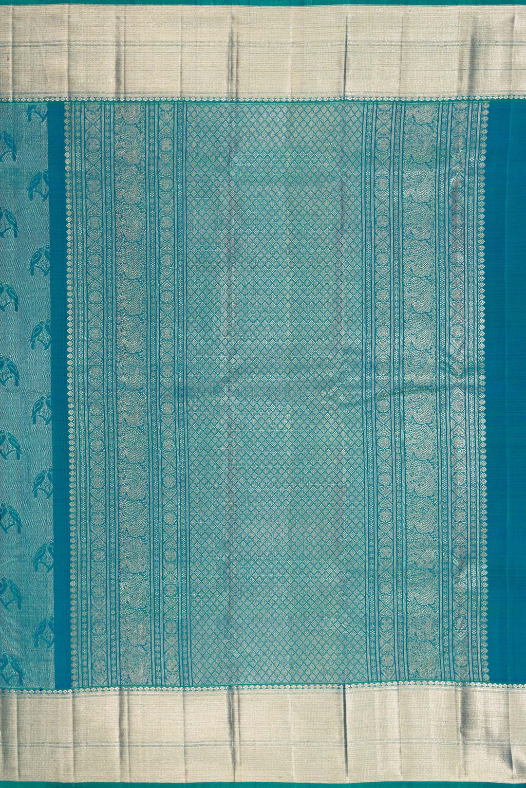 Close up image of the pallu of Peacock Blue Dual Tone Kanchipuram Silk Saree with Zari Brocade on the body and Zari Border. 