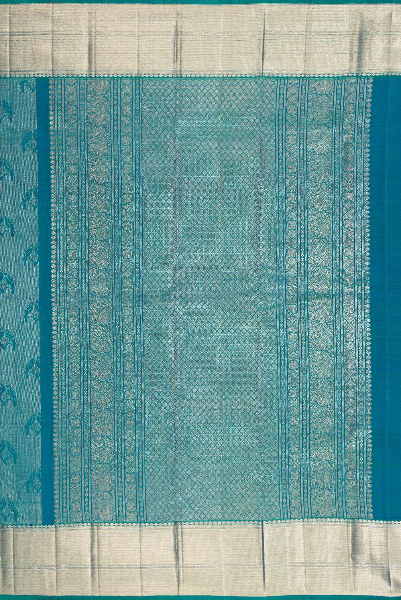 Close up image of the pallu of Peacock Blue Dual Tone Kanchipuram Silk Saree with Zari Brocade on the body and Zari Border. 
