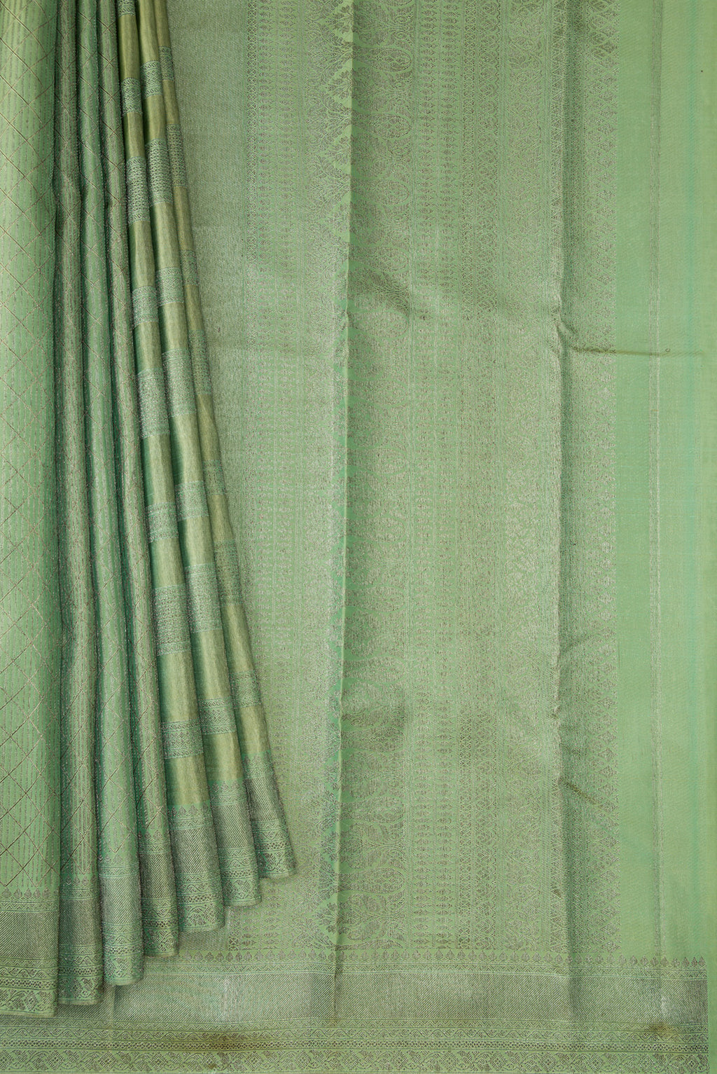 Pleats and pallu of Mehandi Green Dual Tone Kanjivaram Silk Saree with Zari Brocade on the body and Zari Border. 