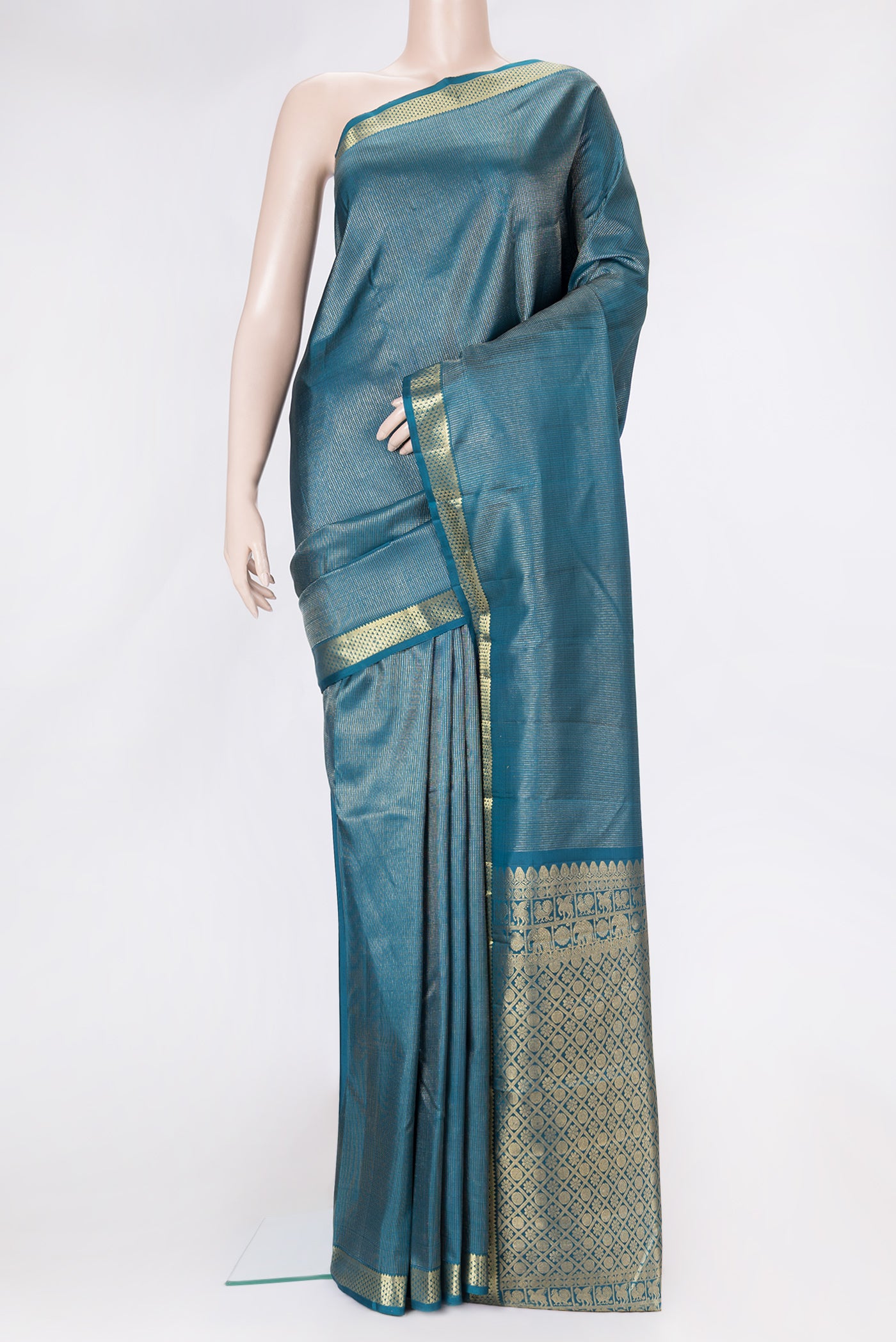 Peacock Blue Dual Tone Kanchipuram Silk Saree with Stripes on the body and Zari Border.  displayed on a mannequin
