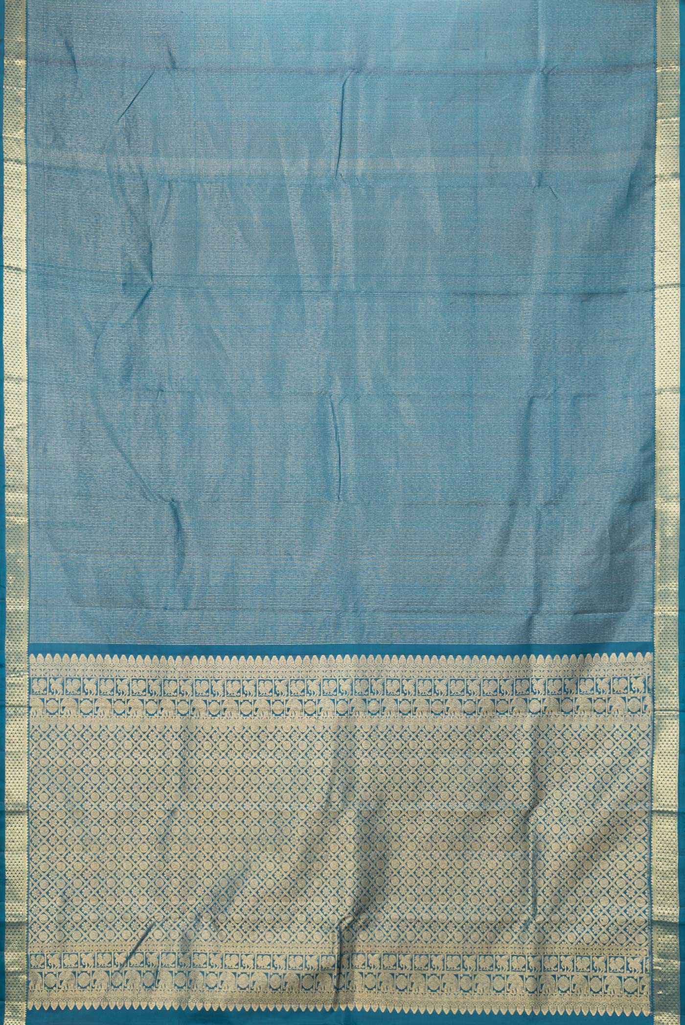 Flat view of Peacock Blue Dual Tone Kanchipuram Silk Saree with Stripes on the body and Zari Border. 