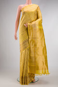 Gold Dual Tone Kanjivaram Silk Saree with Jacquard design on the body and Thread Border.  displayed on a mannequin