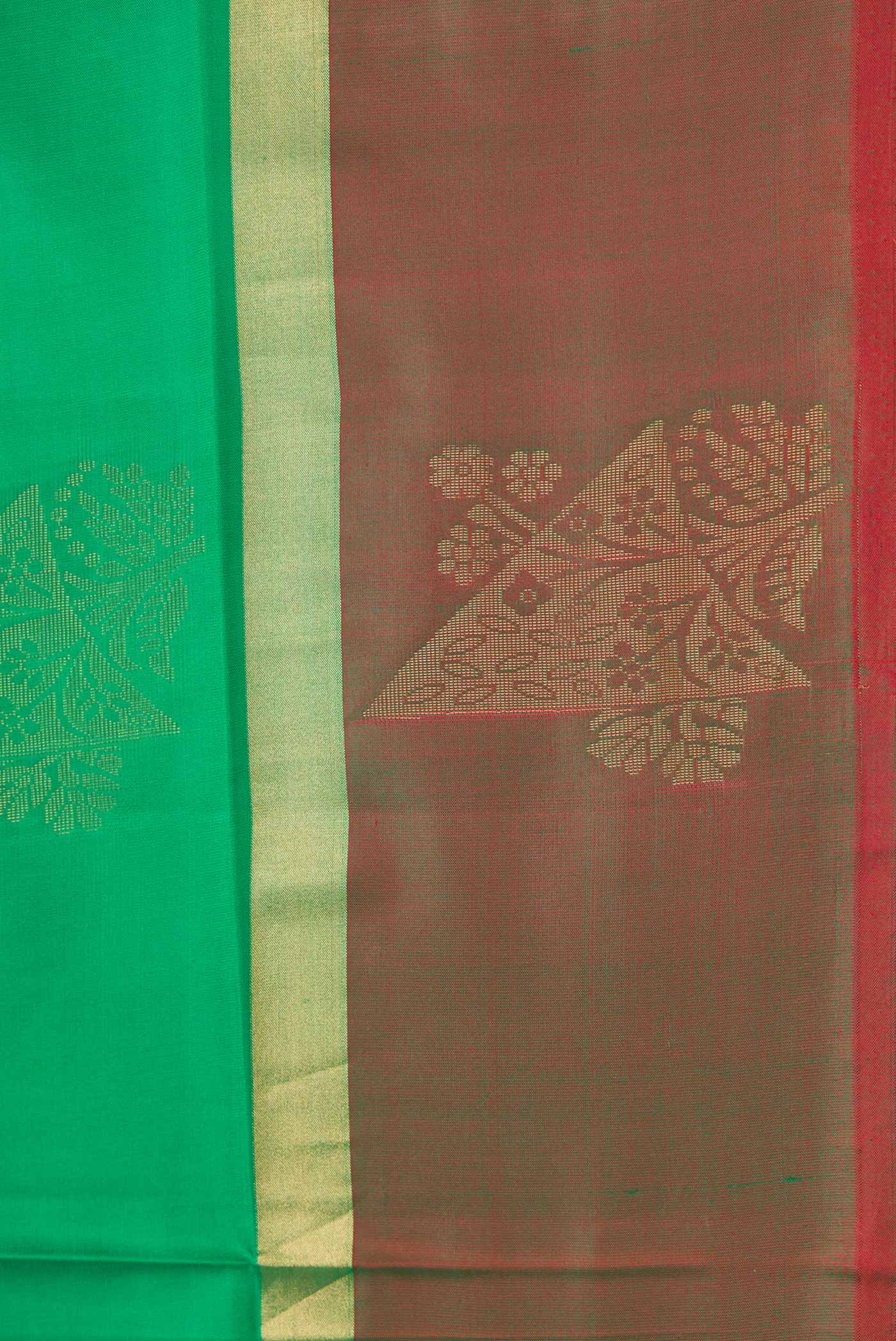 Border image of Green Dual Tone Soft Silk Saree with Zari And Thread Butta on the body and Zari Border
