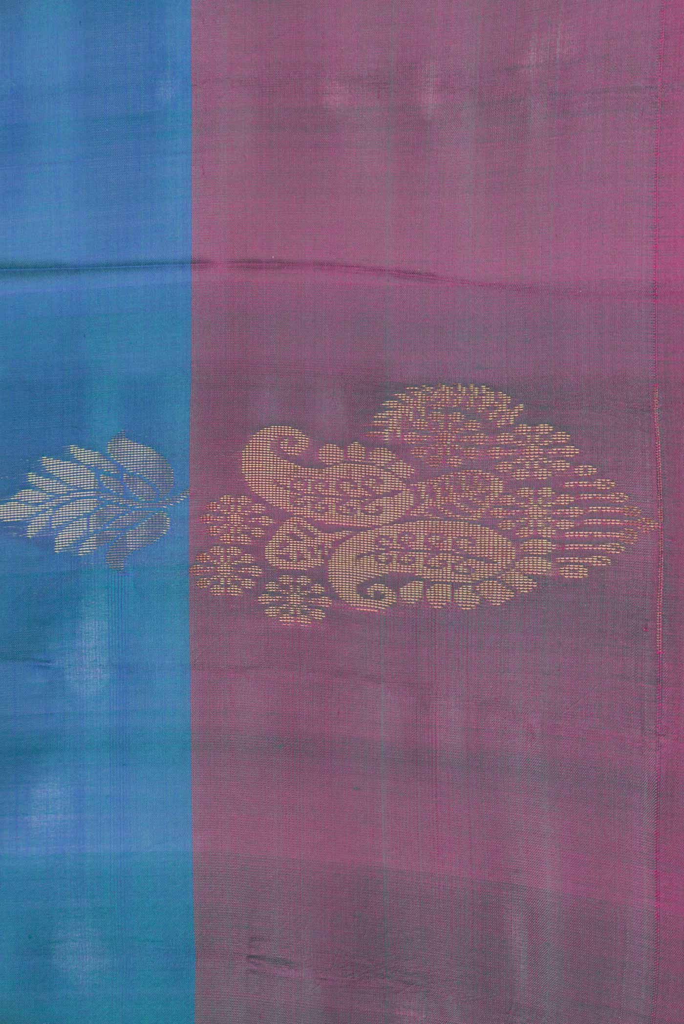 Border image of Peacock Blue Dual Tone Soft Silk Saree with Zari Butta on the body and Zari Border. 