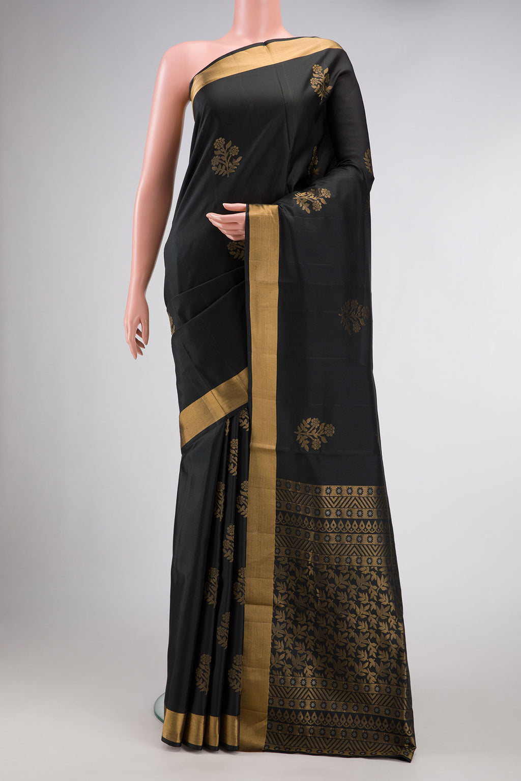 Black Dual Tone Soft Silk Saree with Zari Butta on the body and Zari Border.  displayed on a mannequin