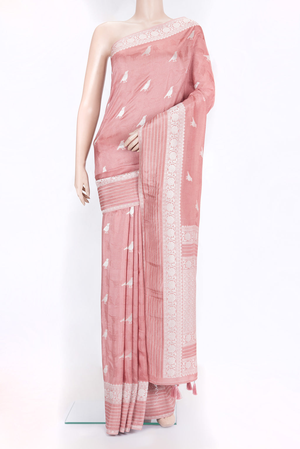 Rose Gold Blended Banarasi Silk Saree with Zari Butta on the body and Fancy Border.  displayed on a mannequin