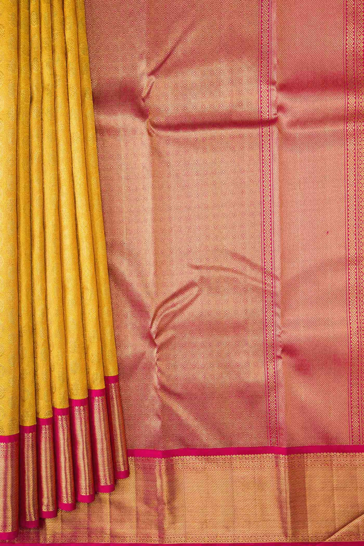 Pleats and pallu of Pure Silk Pure Zari Yellow Dual Tone Kanchipuram Saree with Zari Brocade on the body and Zari Border